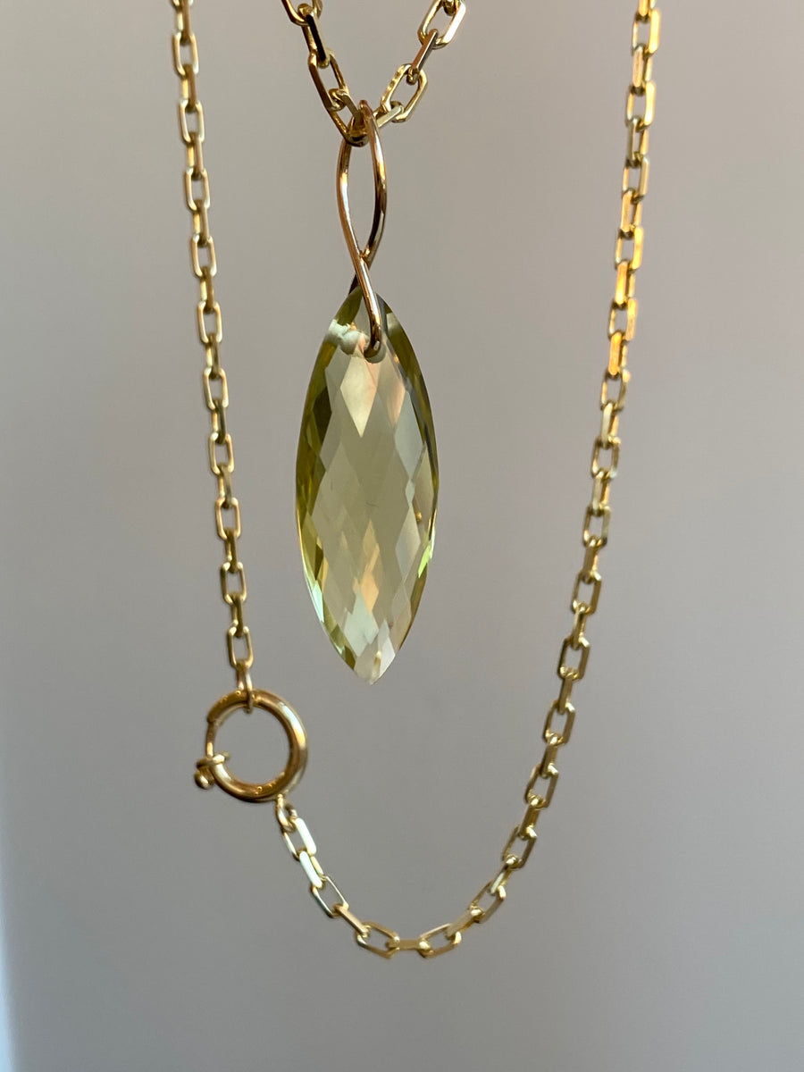 Faceted Marquise Citrine on a 14k yellow gold infinity bale