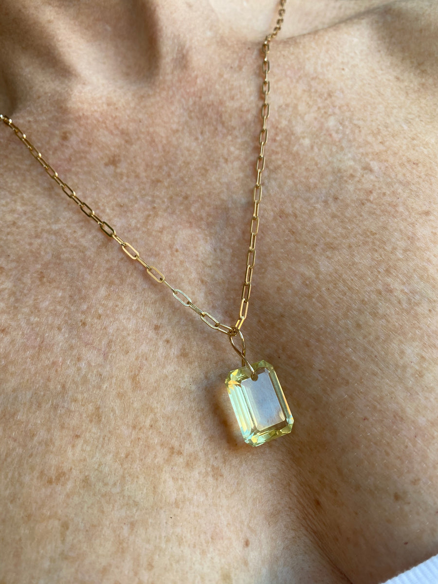 Emerald Cut Citrine on a 14k yellow gold infinity bale
