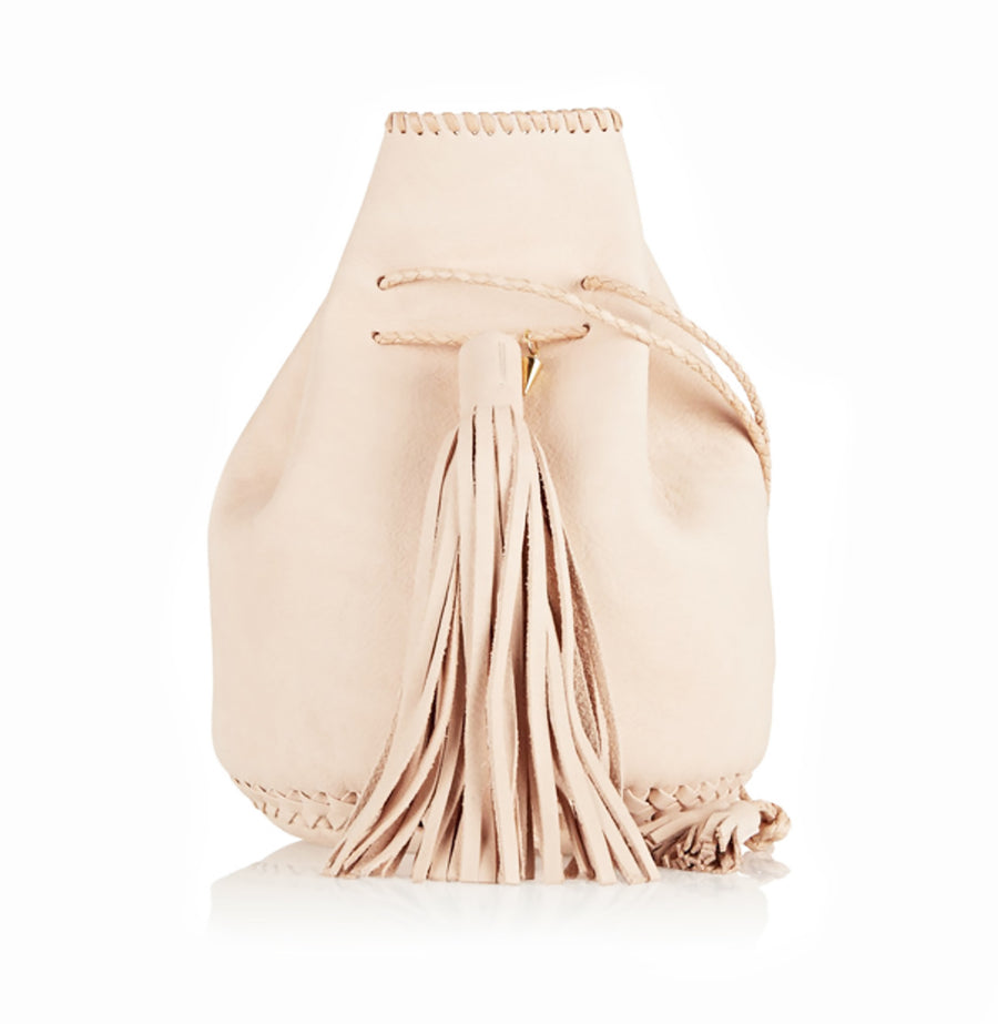 Natural Pink Tan Untanned Leather Whipstitch Bullet Bag Wendy Nichol Designer Purse Handbag Handmade in NYC New York City Leather Fringe Tassel Drawstring Bucket Pouch Boho Handbag