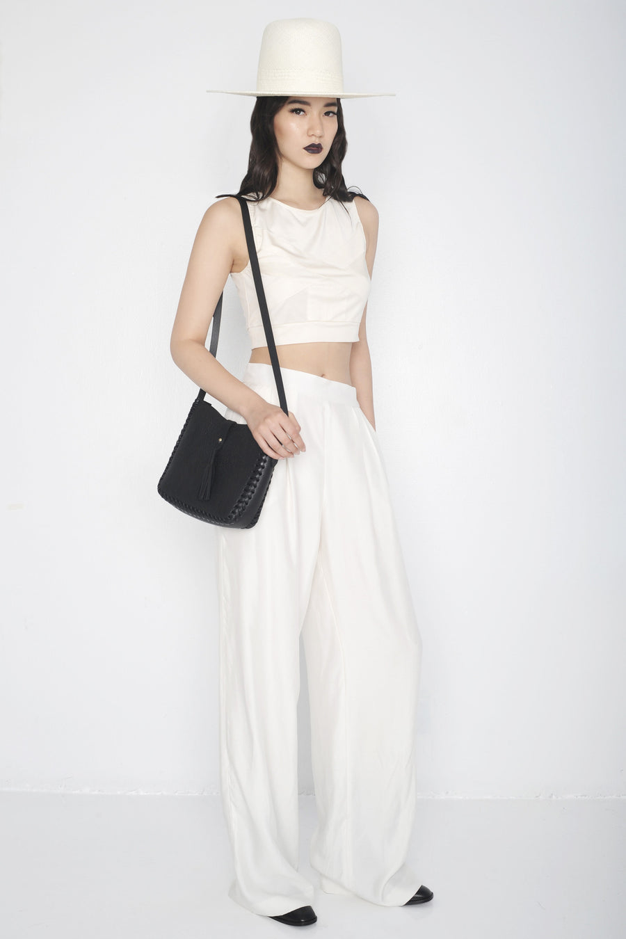 Mona IMG Model Wendy Nichol Clothing Designer Ready to Wear Fashion Runway show SS16 Guardians of Light High Noon Silk Mesh Cross Crop Top Sleeveless Cream White Silk Pleated Wide Leg Pants High Waisted Handmade in NYC  Custom Tailoring Made to Measure Order