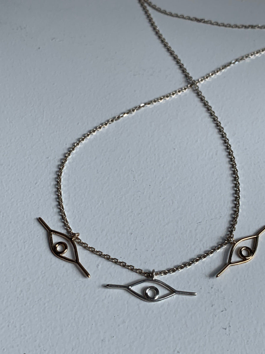 Triple Eye Pendant Necklace