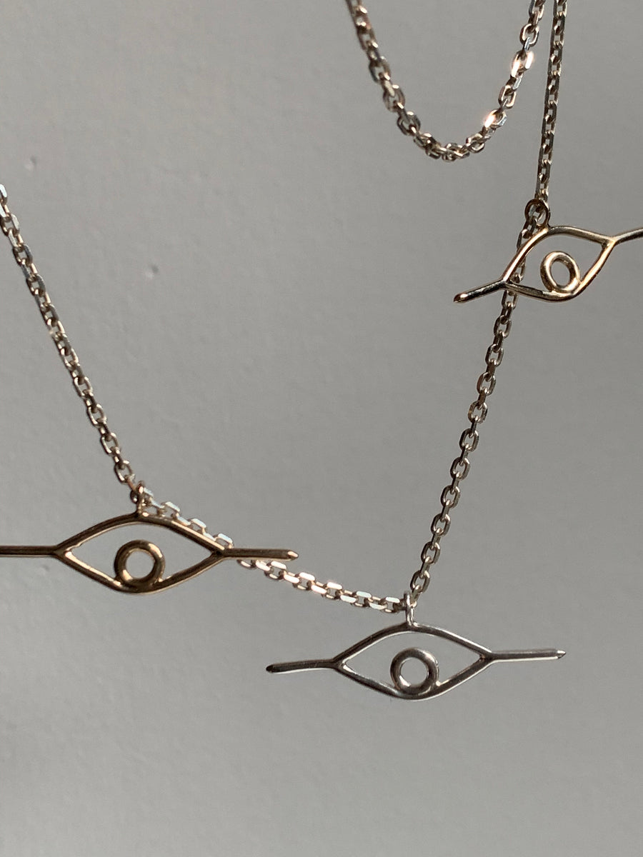 Triple Eye Pendant Necklace