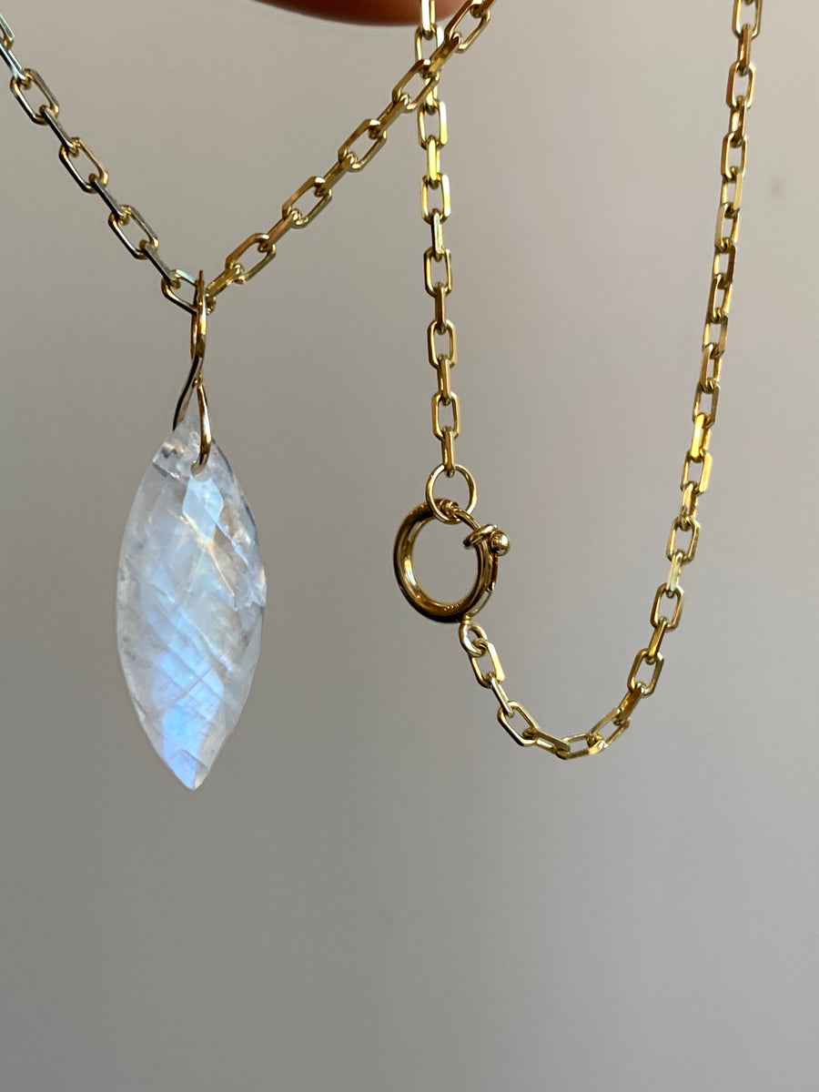 Faceted Marquise Moonstone on a 14k Yellow Gold Infinity Bale