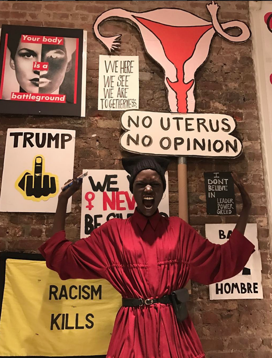 Ajak Deng IMG Model Wendy Nichol AW17 Clothing Fashion Anti Fascist Runway Show Dear America Handmade in NYC New York City Protest March I AM Drawstring Draw String Dress Coat Ruche Ruffle Collar Shirt Dress Red Long sleeves Blouse invisible buttons secret pockets Protest March 