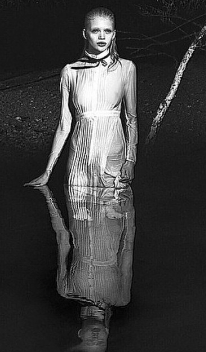 W Magazine Wendy Nichol Water White Silk Cotton Victorian Teacher Dress with Black Lace Trim black Bow Wendy Nichol Clothing Designer Fashion Runway show SS15 Space Master handmade in NYC New York City Bespoke Made to Order Made to Measure custom tailoring Sheer Transparent Fall Summer Spring Long Sleeve High collar Victorian Edwardian button up blouse Teacher dress floor length Black French lace trim Goth Gothic